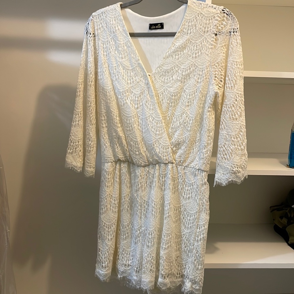 Woman’s crochet romper by Dee Elle